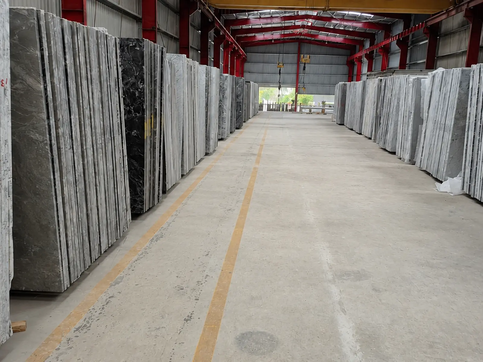 Natural stone granite slabs displayed in a warehouse